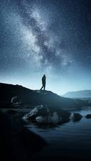 Man Standing Alone Under The Stars